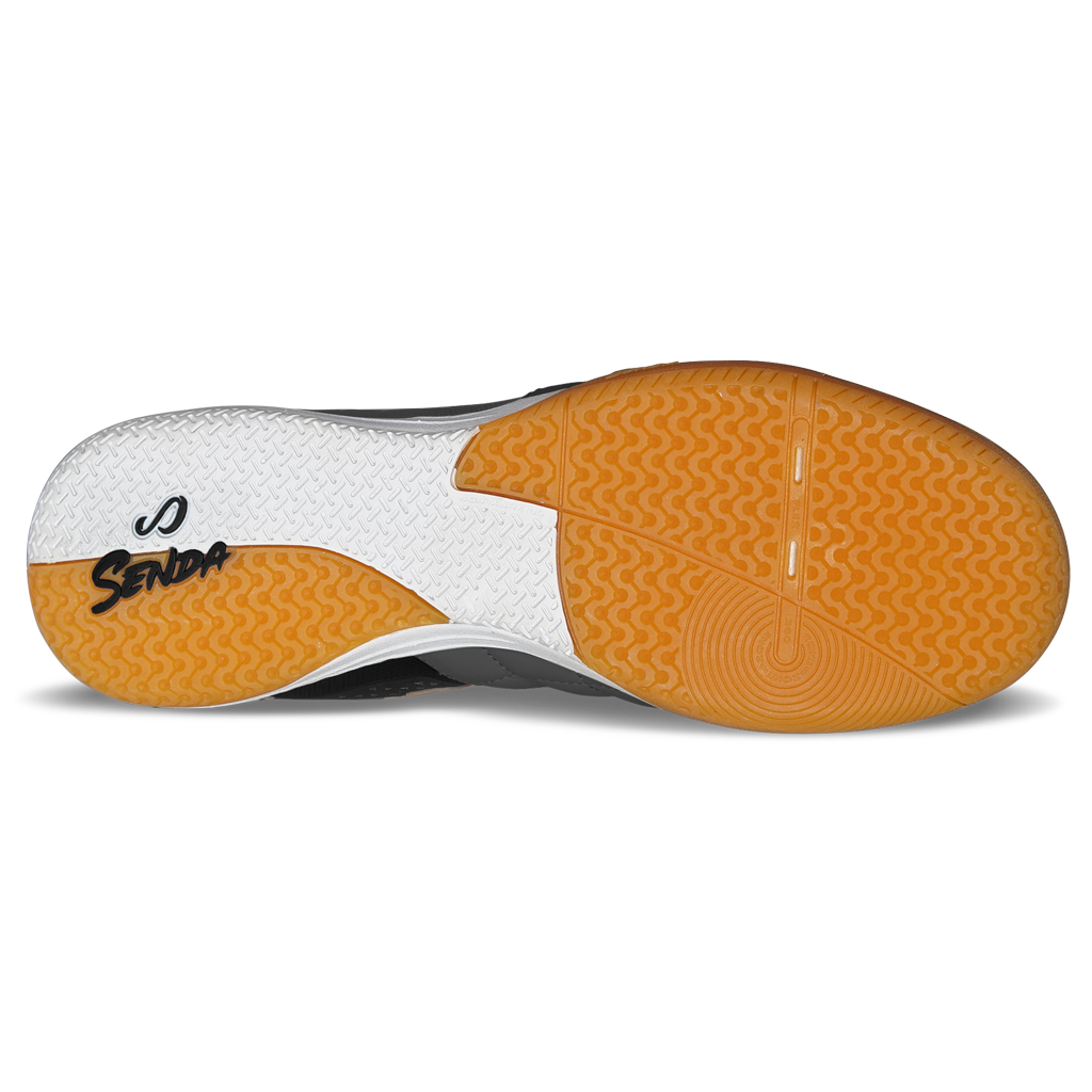 Outsole view of Dark Grey Ushuaia Club 2.0 Futsal Shoes by Senda – Non-marking gum rubber sole with herringbone traction pattern for grip and agility on indoor futsal courts.