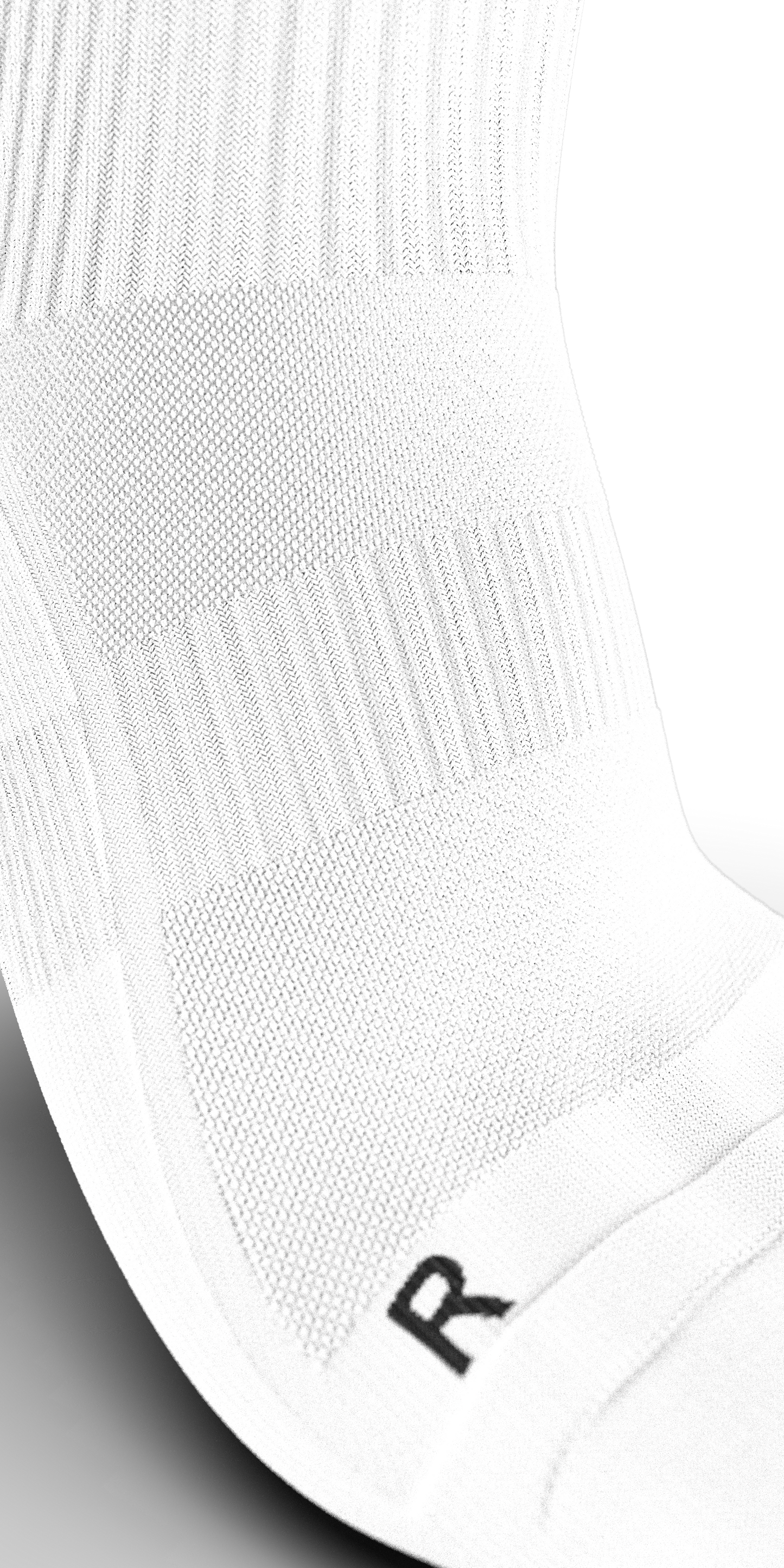 Close-up of Senda Gravity Pro white grip sock showing compression knit zone and reinforced ankle support.