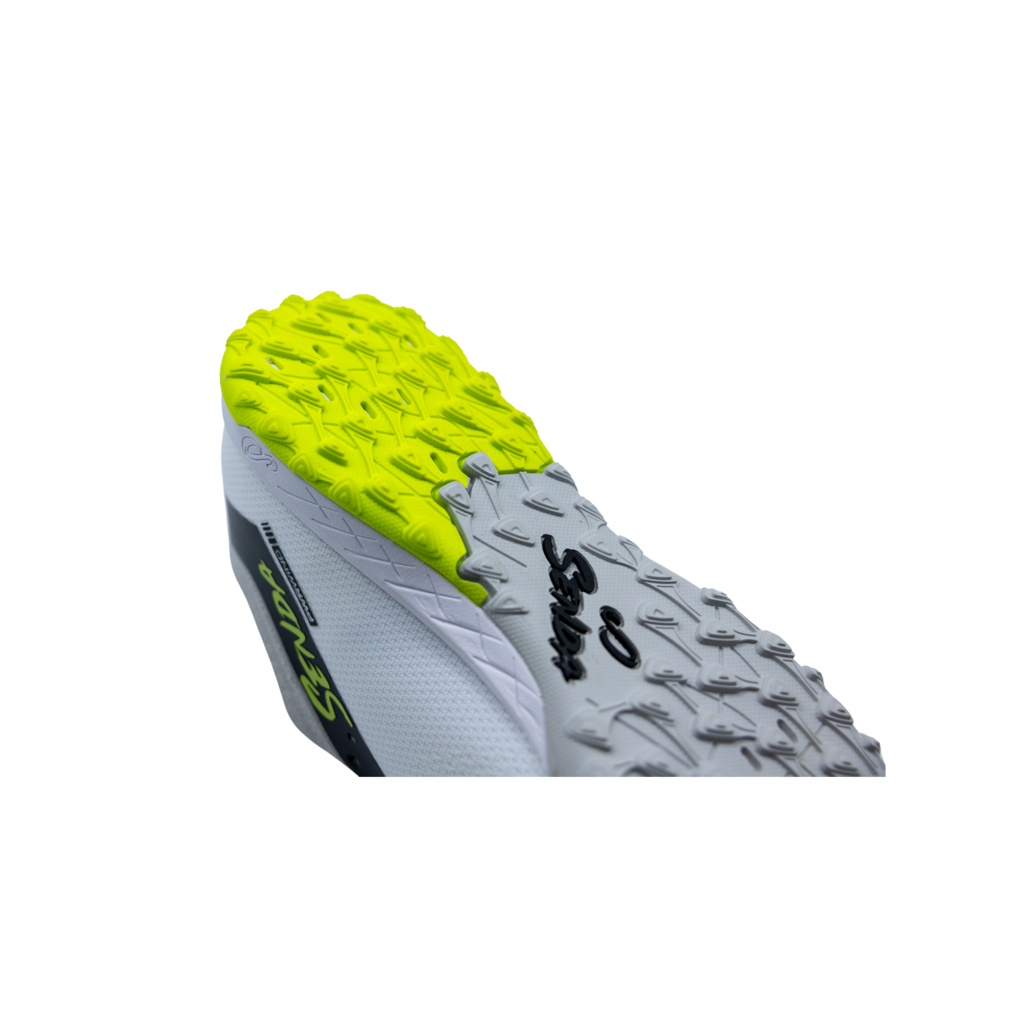 Rear angled view of Senda Pampa Pro Turf shoe highlighting aggressive heel traction lugs and durable rubber outsole for turf grip.