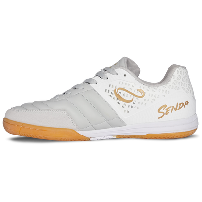 Senda Ushuaia Club 2.0 futsal shoe in white and gold—side view with breathable mesh panel, gold S logo, and quilted synthetic toe box for indoor play.

