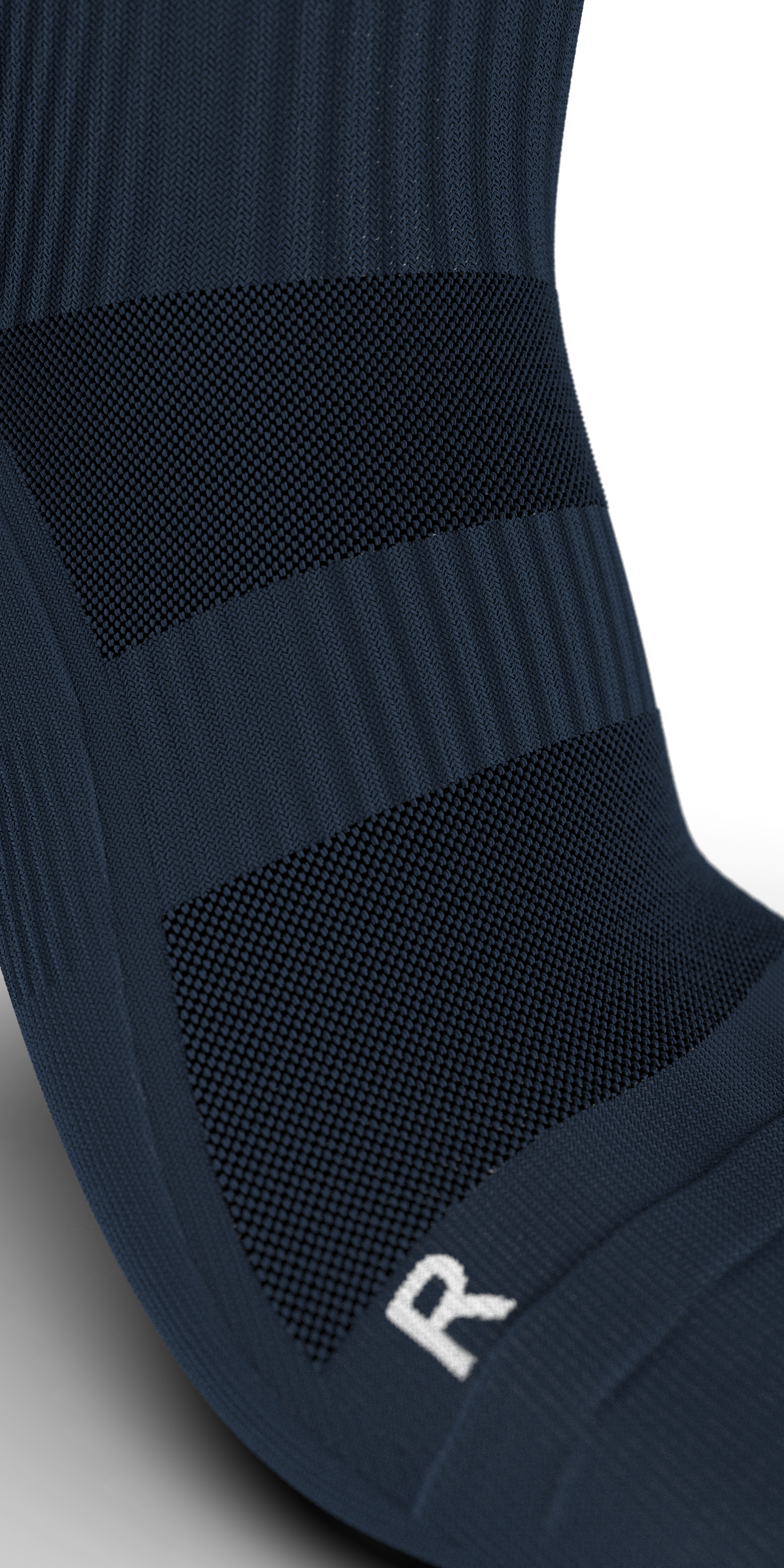 Detailed view of navy blue Gravity Pro Crew Sock highlighting firm compression band and breathable mesh fabric.

