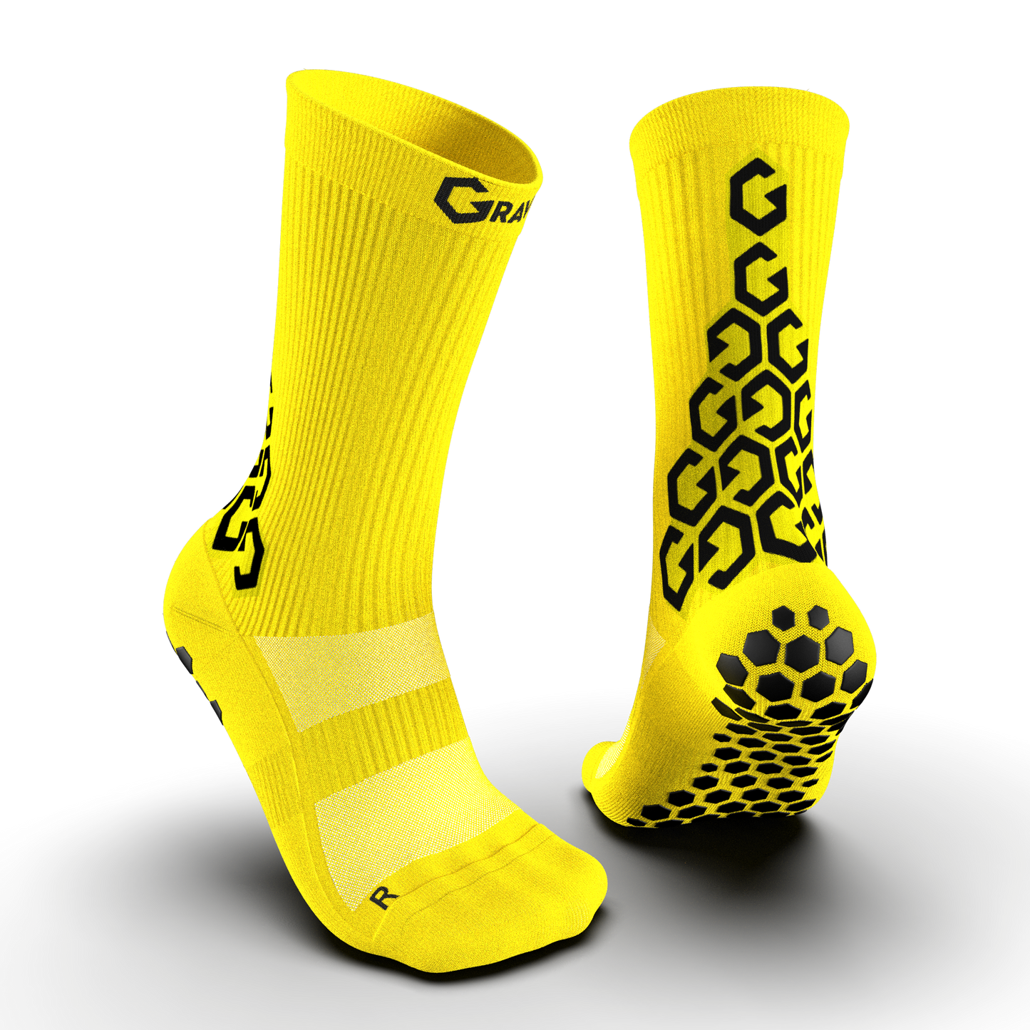 Bright yellow Senda Gravity Pro Grip Socks featuring black anti-slip grip and compression design for peak athletic performance.

