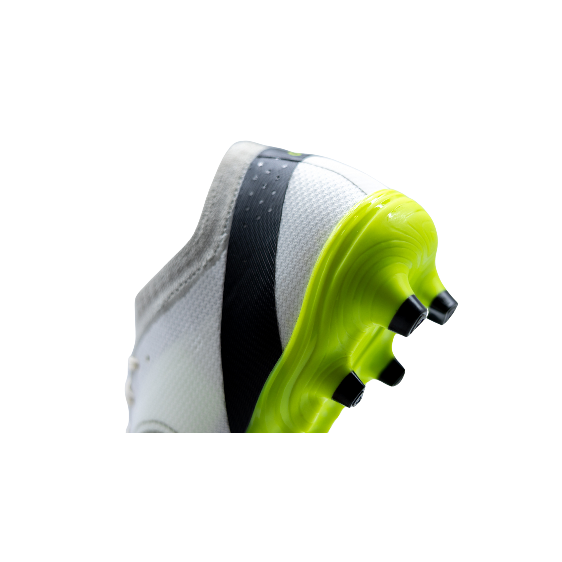 Rear view of Senda Pampa Pro Soccer Cleats highlighting black heel strap and neon stud design for firm ground traction.

