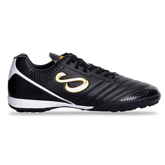 Side profile of Senda Ushuaia Academy Turf Black futsal shoe with stitched toe box, embossed grip zone, and indoor turf sole.

