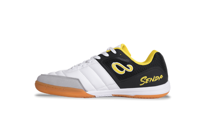 Lateral side of Senda Ushuaia Club 2.0 white futsal shoe featuring bold yellow Senda logo and durable synthetic panels.

