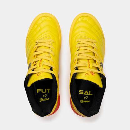 Top view of Senda Ushuaia Pro 2.0 yellow futsal shoes showing FUT SAL insole branding and detailed lacing pattern.

