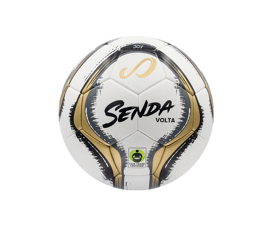 Front view of Senda Volta soccer ball featuring gold and black brushstroke design with Fair Trade Certified logo and durable panel stitching.

